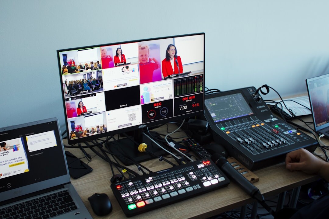 Video editing workstation with multiple monitors showing footage