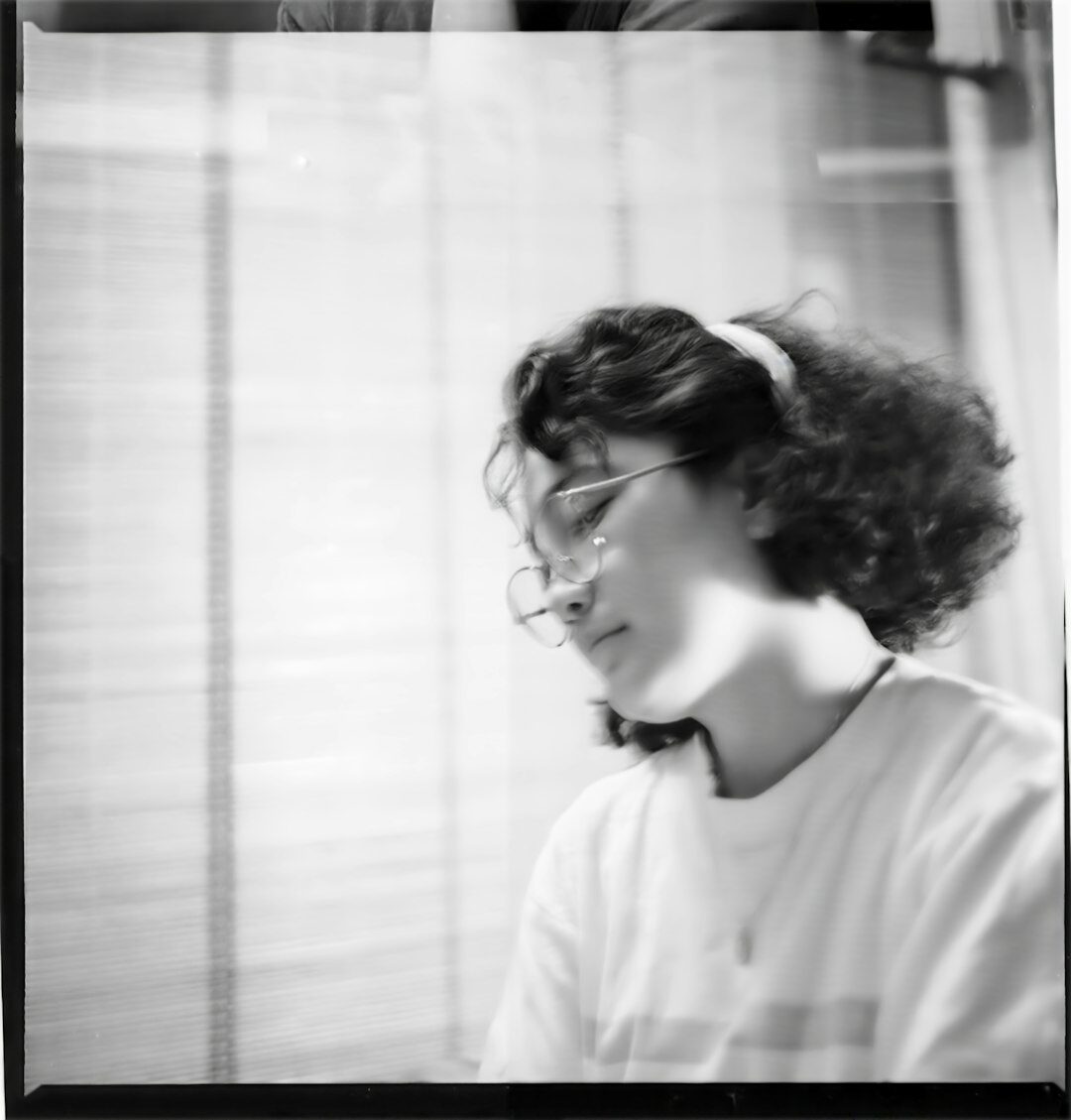 Studio portrait of a European woman in her 30s, broadcast director
